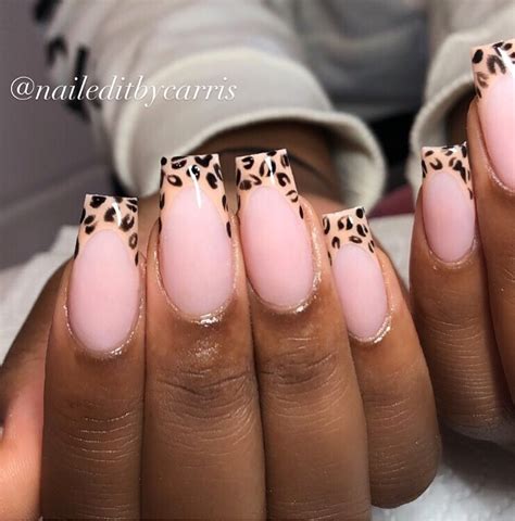 leopard print acrylic nails.